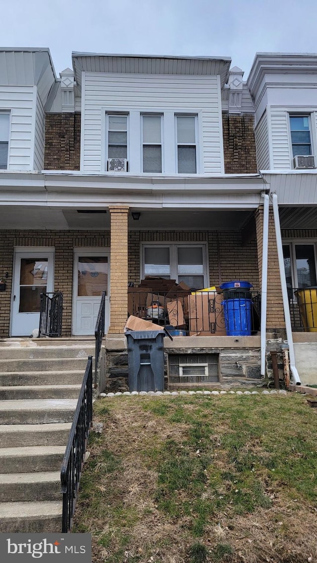 view of home's exterior featuring a porch