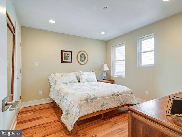 bedroom featuring light wood-type flooring