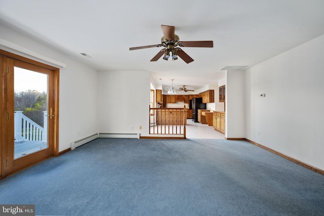 unfurnished living room featuring a baseboard heating unit, ceiling fan, and light colored carpet