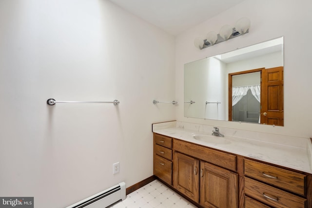 bathroom featuring vanity and a baseboard heating unit