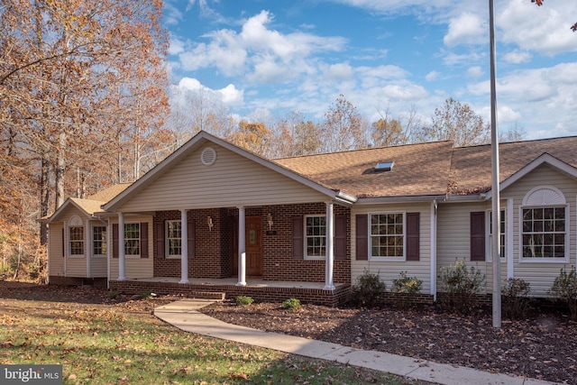 ranch-style house featuring a porch