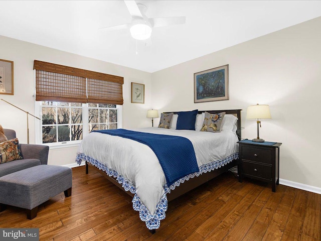 bedroom with hardwood / wood-style floors and ceiling fan