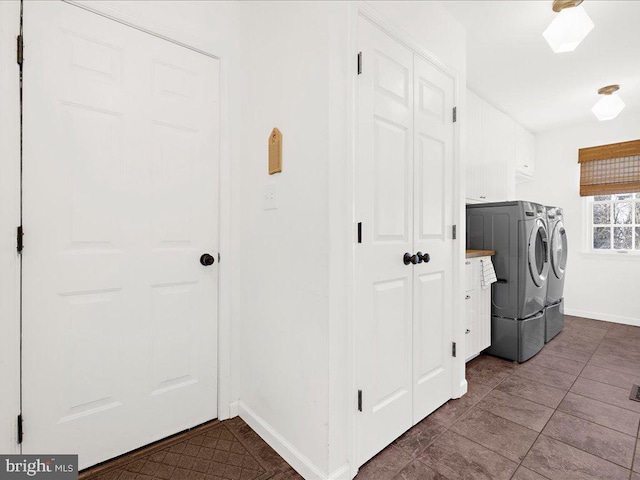 laundry area with separate washer and dryer