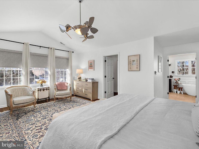 bedroom with vaulted ceiling and ceiling fan