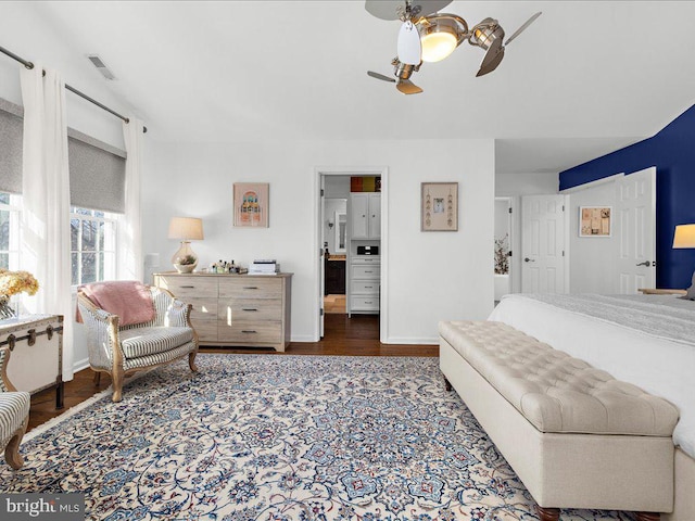 bedroom featuring dark wood-type flooring and ceiling fan