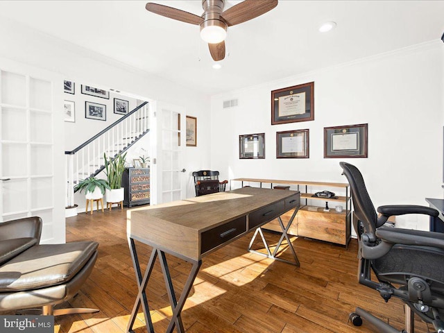 home office with ornamental molding, dark wood-type flooring, and ceiling fan