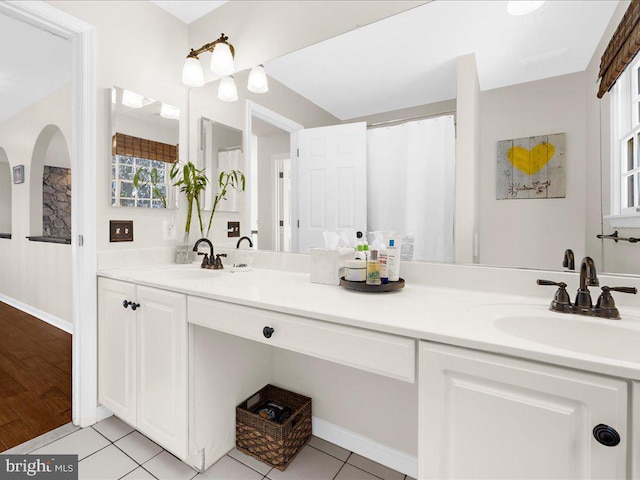 bathroom with vanity and tile patterned floors