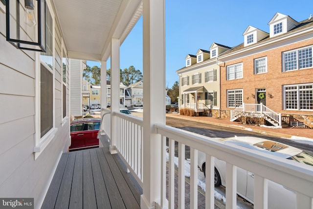 balcony featuring a porch