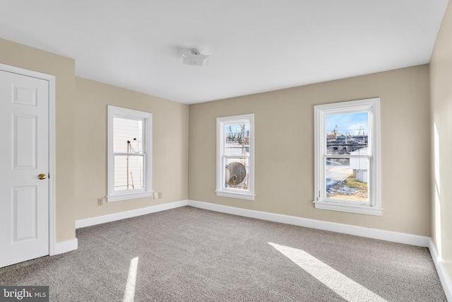 empty room with carpet floors