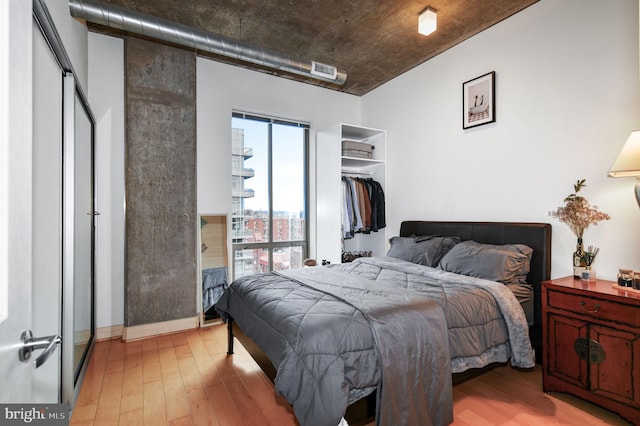 bedroom featuring light hardwood / wood-style floors