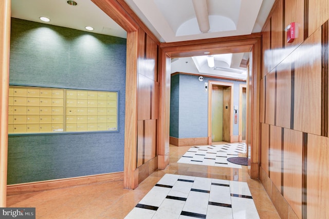 hallway featuring light tile patterned flooring, recessed lighting, wallpapered walls, mail area, and elevator