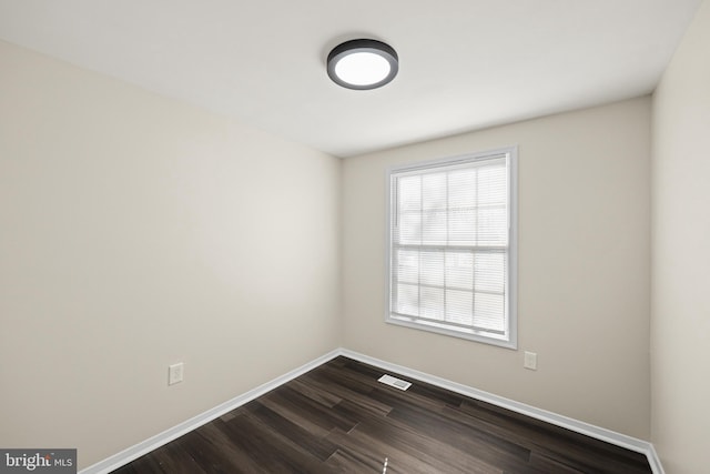 empty room featuring hardwood / wood-style floors