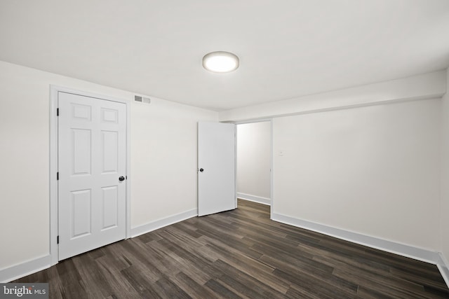 interior space with dark hardwood / wood-style floors