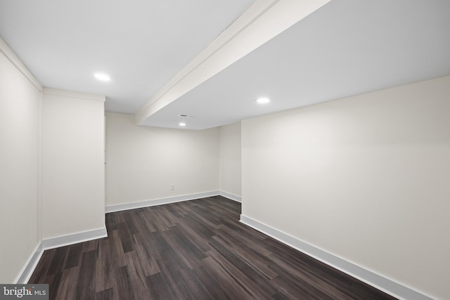 basement featuring dark hardwood / wood-style floors