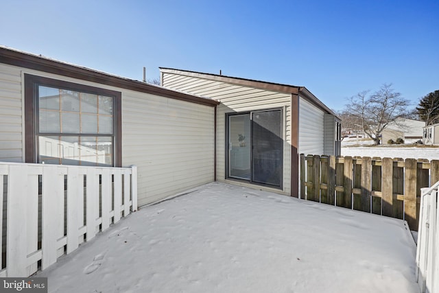 view of snow covered patio