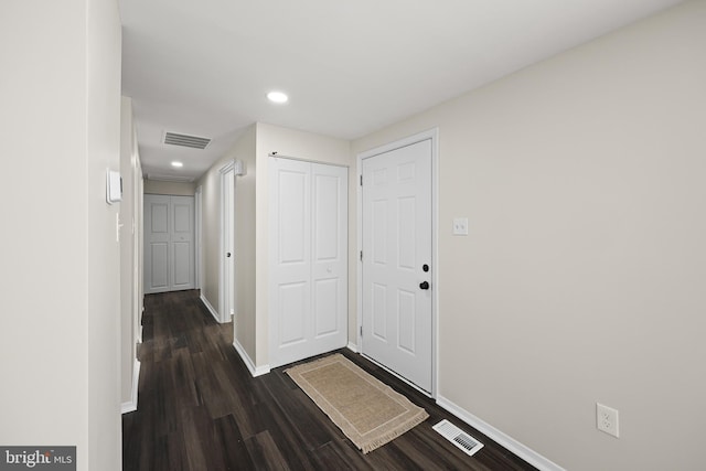 hallway featuring dark hardwood / wood-style floors