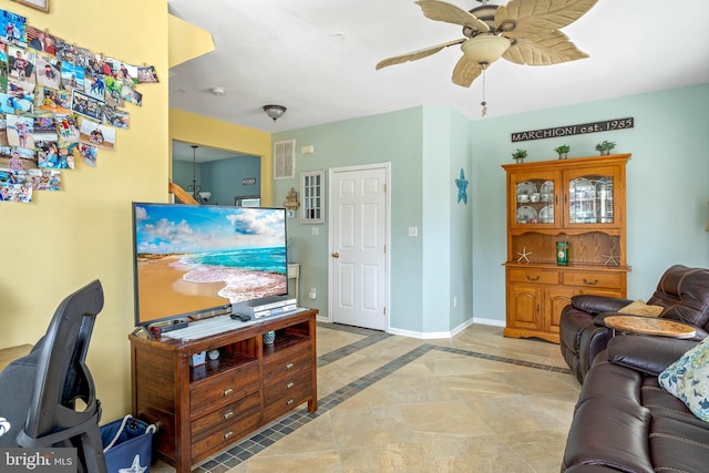 living room with ceiling fan