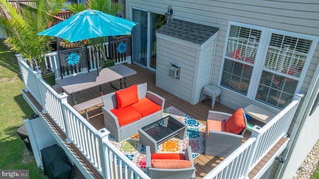 wooden deck with outdoor lounge area