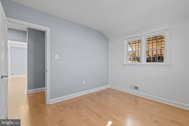 empty room with light wood-type flooring