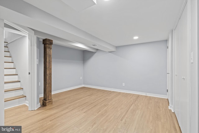 basement featuring light hardwood / wood-style flooring