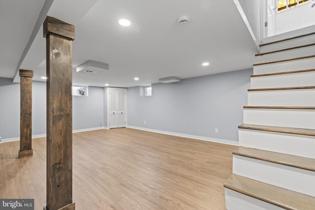 basement with light wood-type flooring