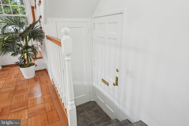 interior space with dark parquet flooring