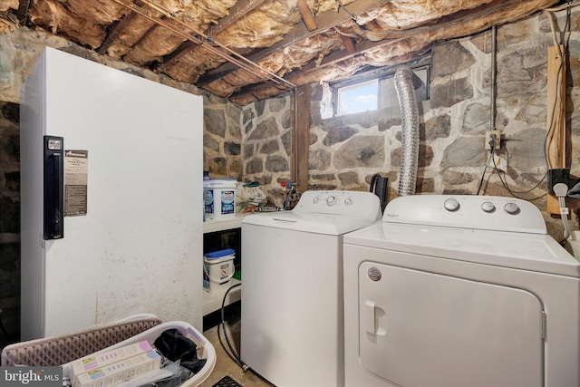 laundry area with washer and clothes dryer