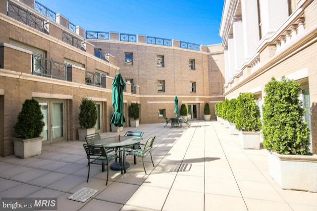 view of home's community with a patio