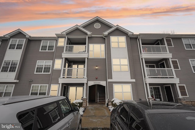 view of outdoor building at dusk