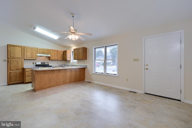 kitchen featuring stainless steel range, ceiling fan, lofted ceiling, and kitchen peninsula