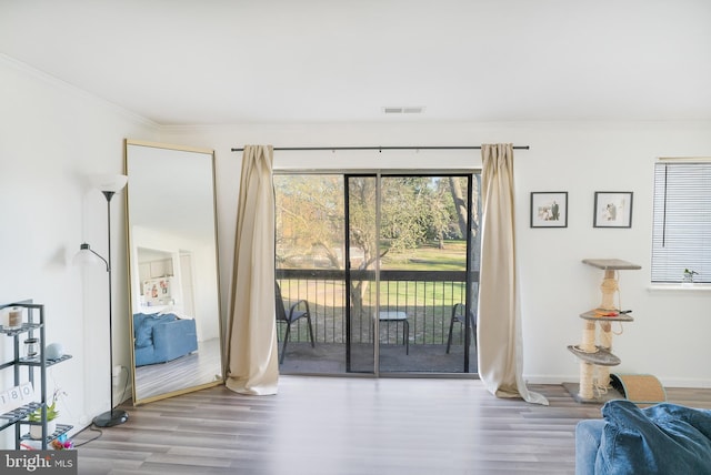 doorway to outside with hardwood / wood-style flooring