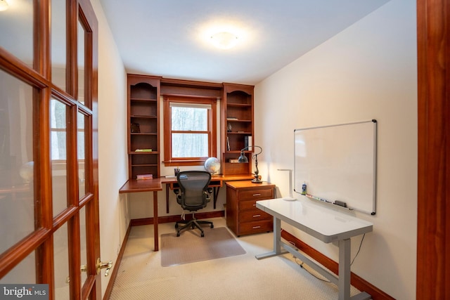 office space featuring light colored carpet