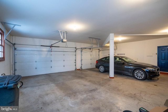 garage featuring a garage door opener