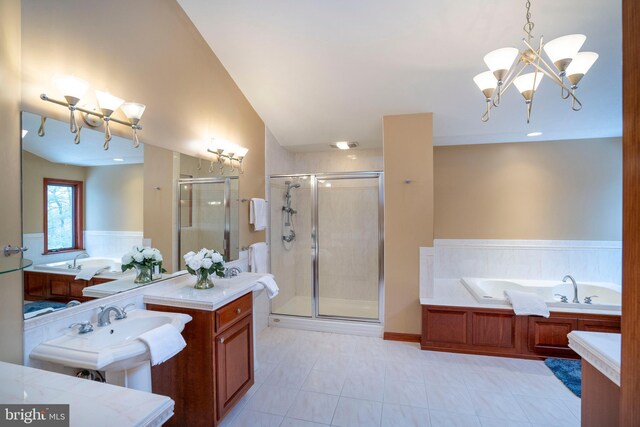 bathroom with tile patterned floors, lofted ceiling, a notable chandelier, and shower with separate bathtub