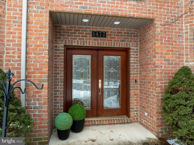 entrance to property featuring french doors