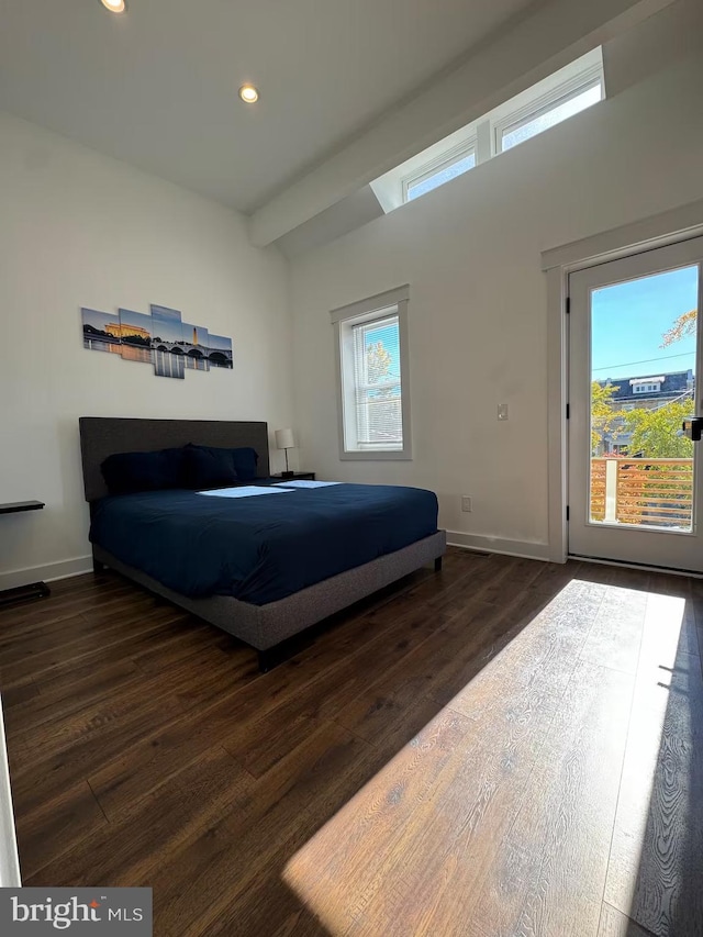 bedroom with baseboards, dark wood-type flooring, recessed lighting, and access to exterior