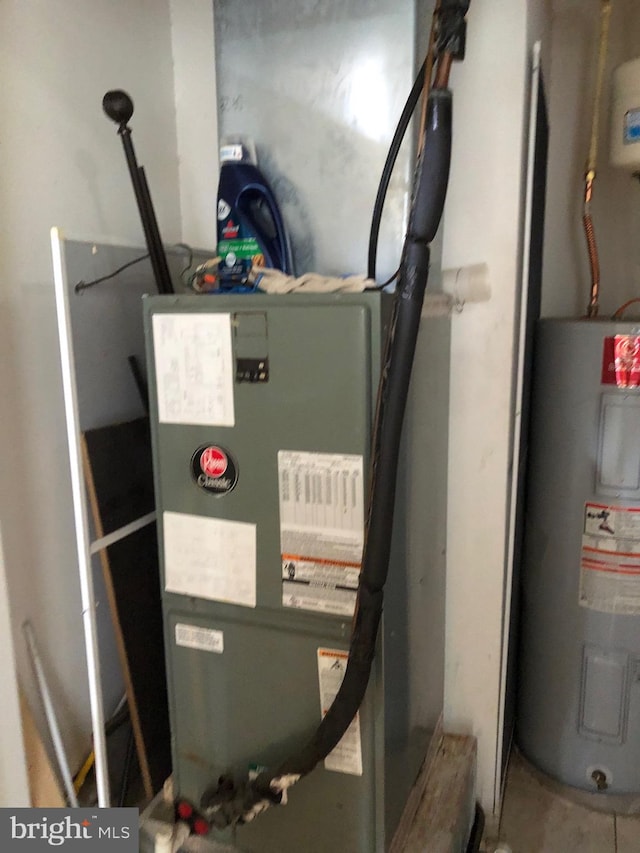 utility room with water heater