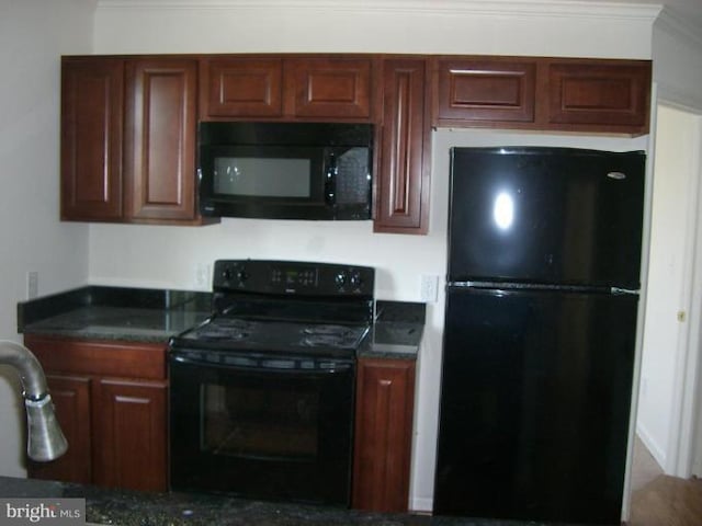 kitchen with ornamental molding and black appliances