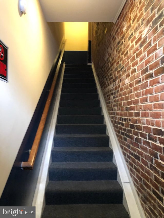 stairs with brick wall