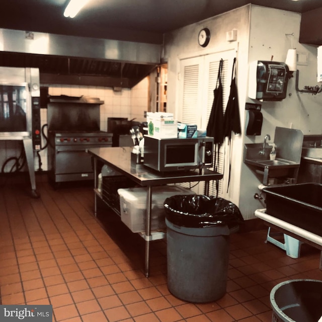 kitchen featuring tile patterned flooring and range