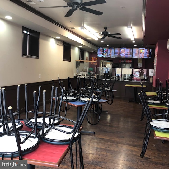 dining space with dark hardwood / wood-style flooring