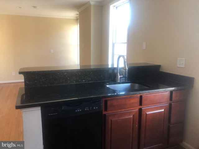 kitchen featuring sink, crown molding, light wood-type flooring, dishwasher, and kitchen peninsula