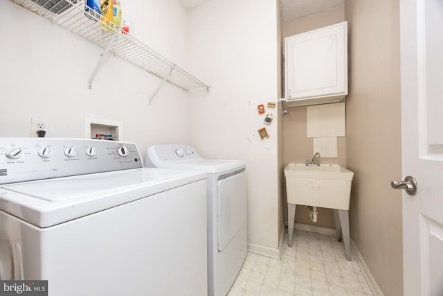 washroom with separate washer and dryer