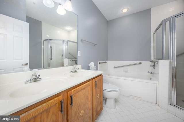 full bathroom featuring vanity, a textured ceiling, tile patterned floors, independent shower and bath, and toilet