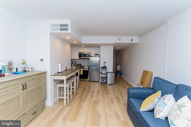 living room featuring light hardwood / wood-style floors