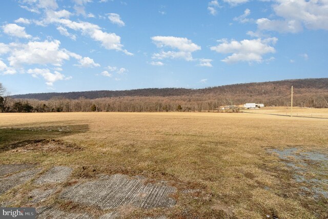 exterior space featuring a rural view