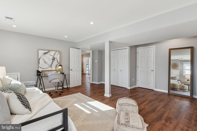 living room with dark hardwood / wood-style floors