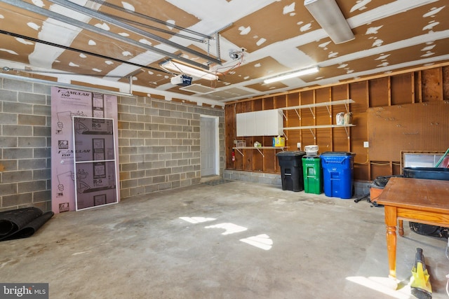 garage featuring a garage door opener