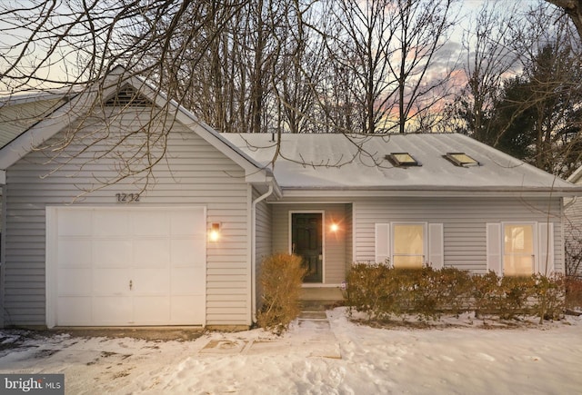 view of front of home with a garage