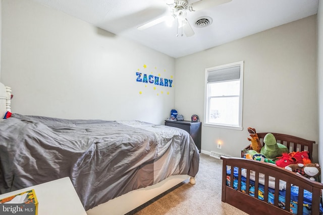 carpeted bedroom with ceiling fan